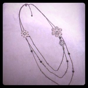 Long jeweled flower accent necklace